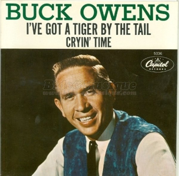 Buck Owens - I've got a tiger by the tail
